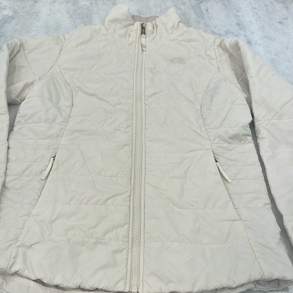The North Face cream jacket